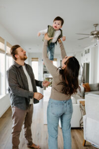 mom, dad and baby in kitchen