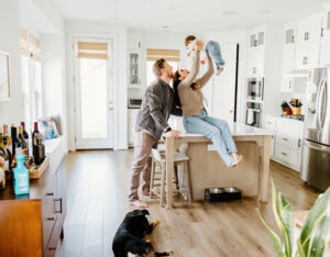 family on kitchen counter | in home family session