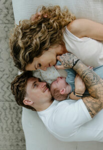 mother and father during newborn photography session