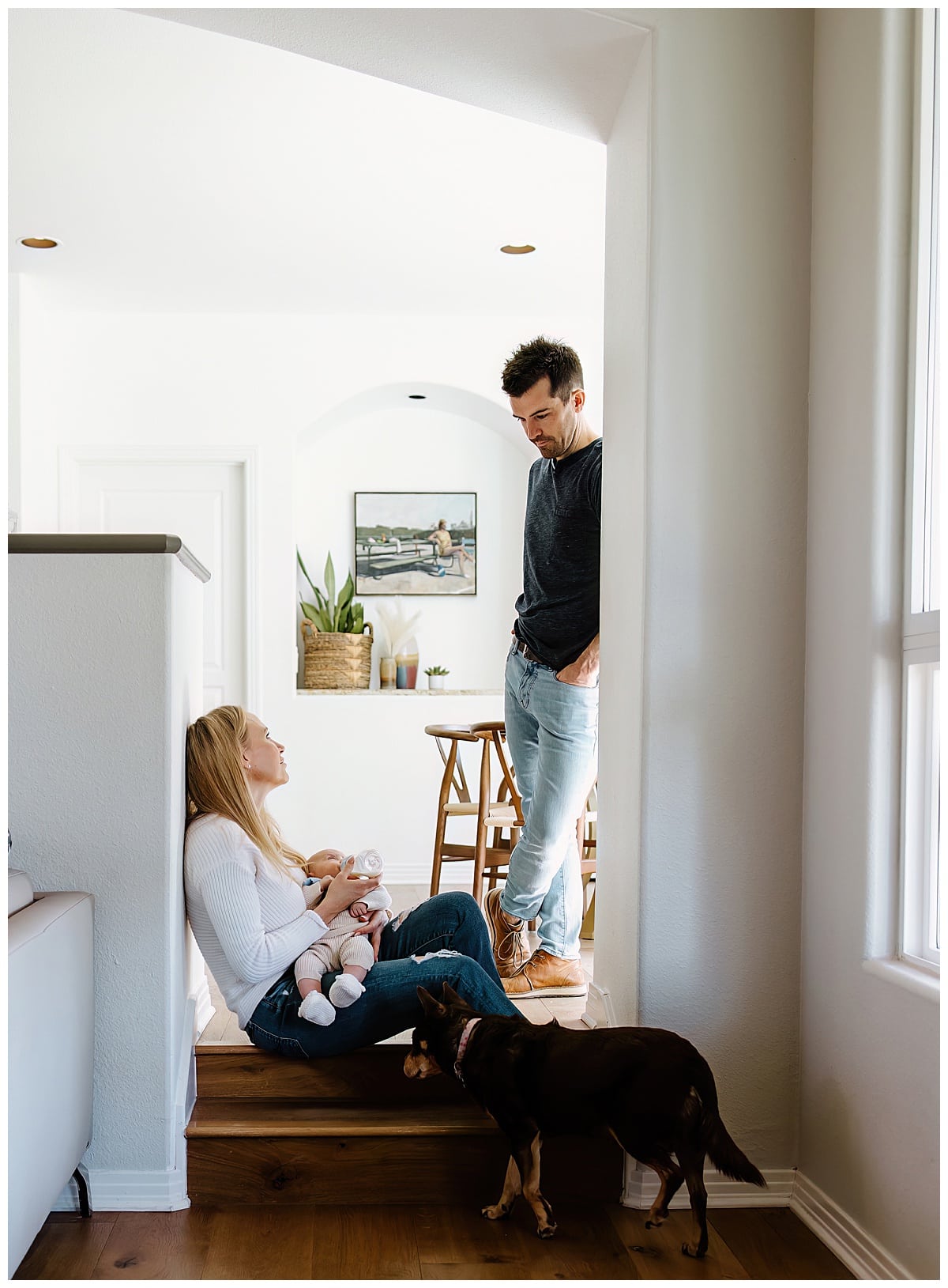 Dad and mom share a glance at one another for Our Adventuring Souls Photography