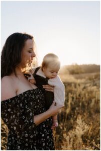 Mom holds youngest son for Our Adventuring Souls Photography