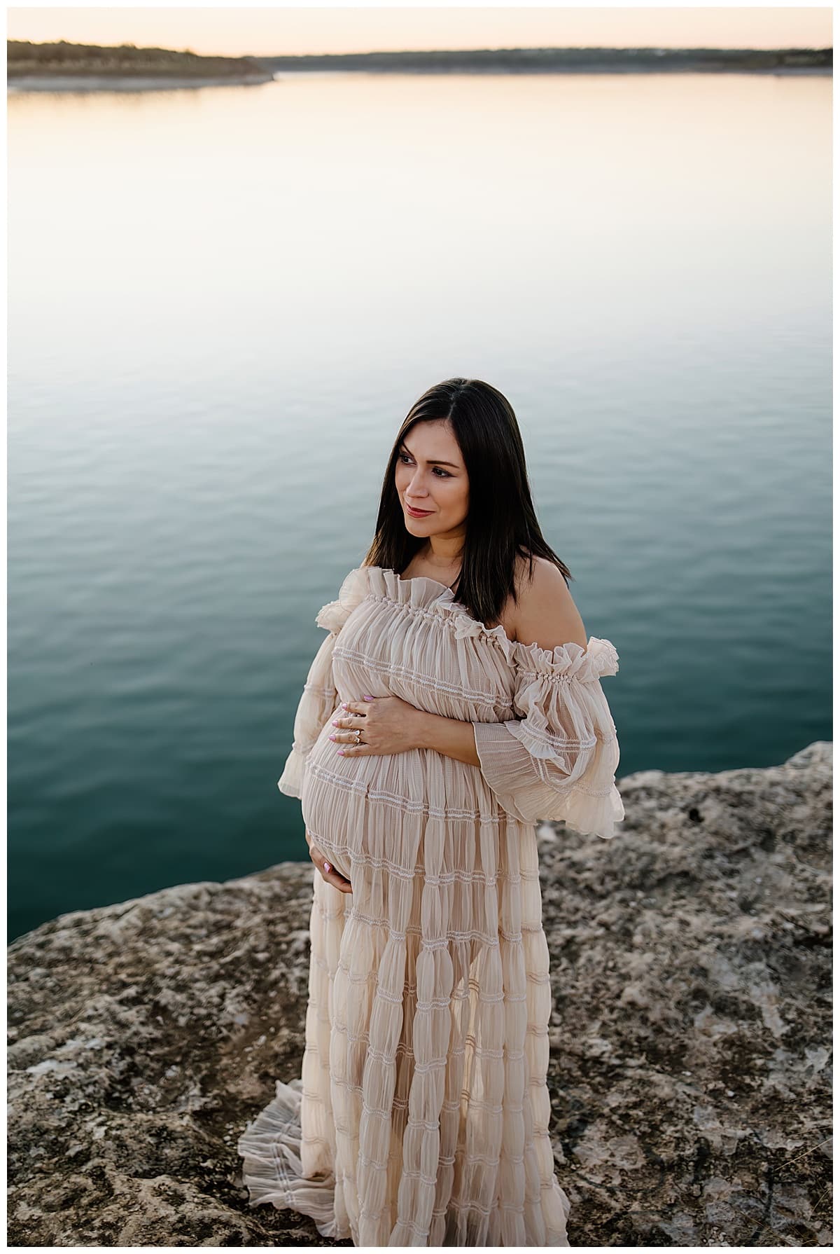 Mom embraces pregnant belly during her outdoor lifestyle photoshoot