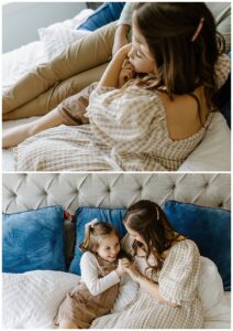 Mom cuddle young girl during In-Home Documentary Family Photos