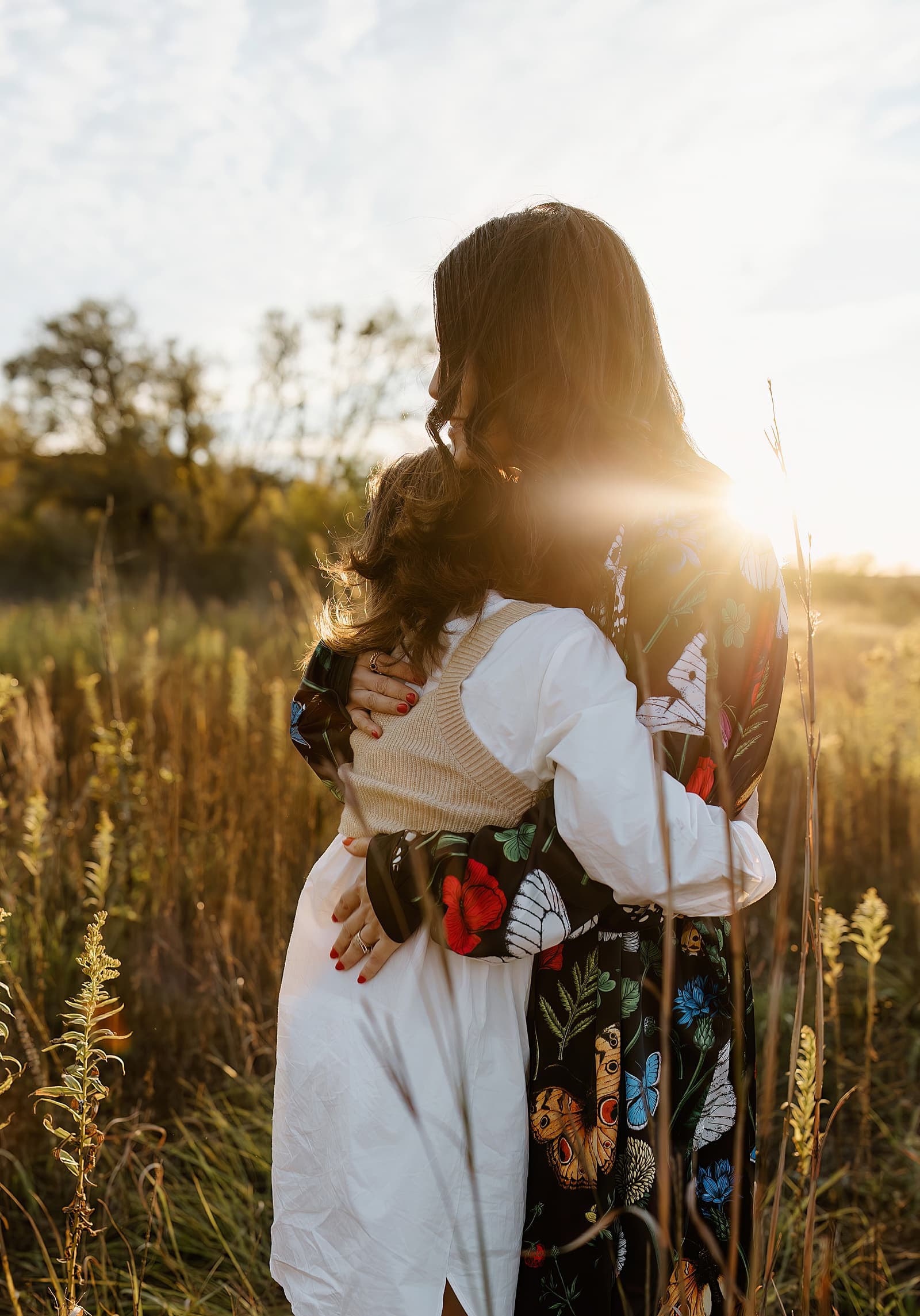 Mom hugs daughter for Austin Family Photographer