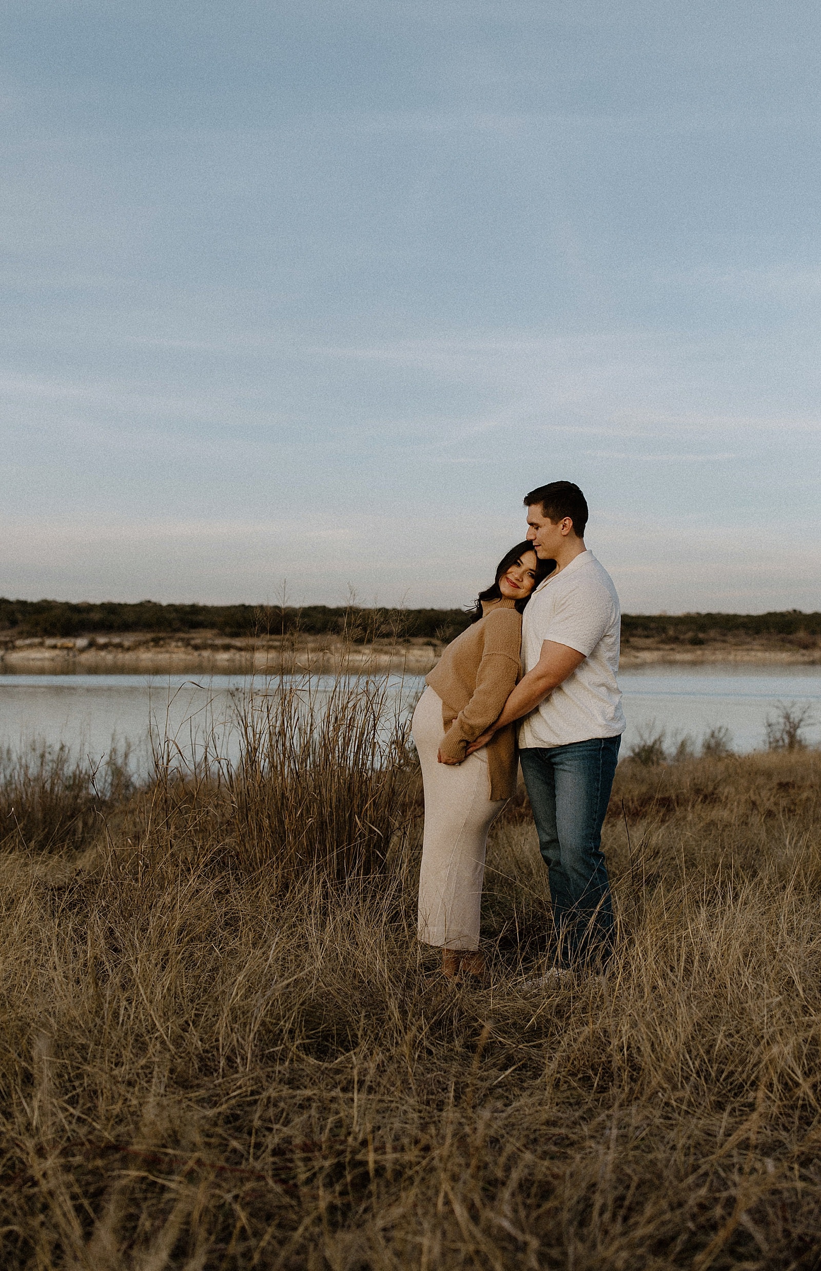 Mom lays her head on dad for Our Adventuring Souls Photography